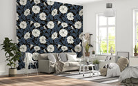 This lounge area benefits from the dramatic impact of Moonflowers Wallpaper.