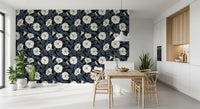 The Moonflowers Wallpaper showcases glowing petals over a black base.