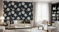 A restful atmosphere within the Living room highlights the Moonflowers Wallpaper.