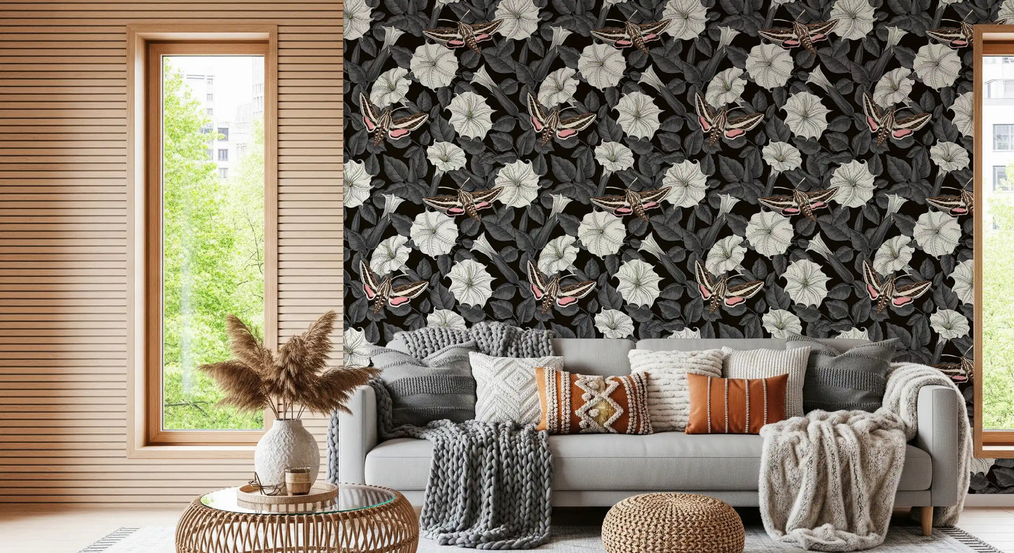 Elegant moonflower wallpaper provides a sophisticated backdrop for this living area.