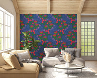 Bright floral wallpaper introduces energetic colours alongside a wooden hallway cabinet.