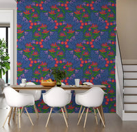 Tropical Tangle Floral Bird of Paradise Fuchsia Pink Blue Wallpaper fills the dining room.