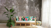 A botanical wall mural showing Misty Birch Grove imagery sits inside an airy lounge.