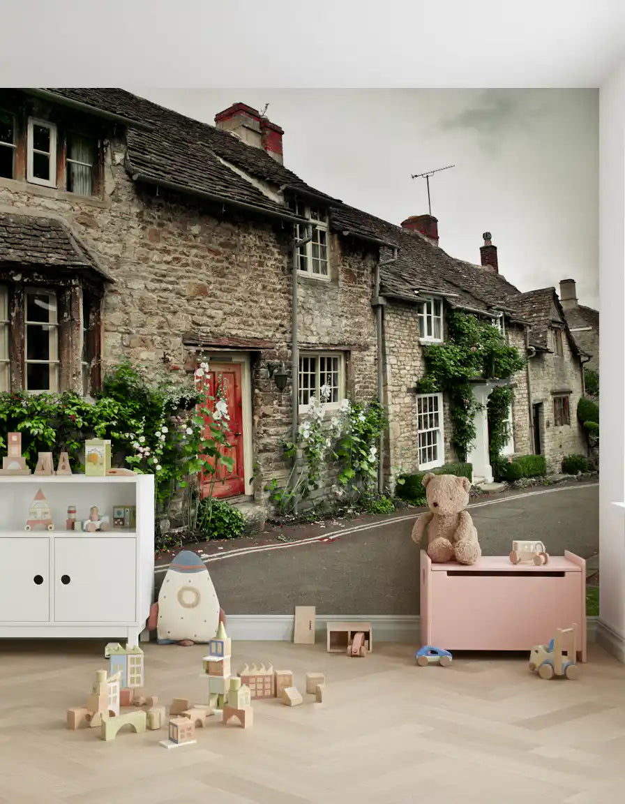Playful building blocks rest against the kids room Timeless English Cottages wall mural.