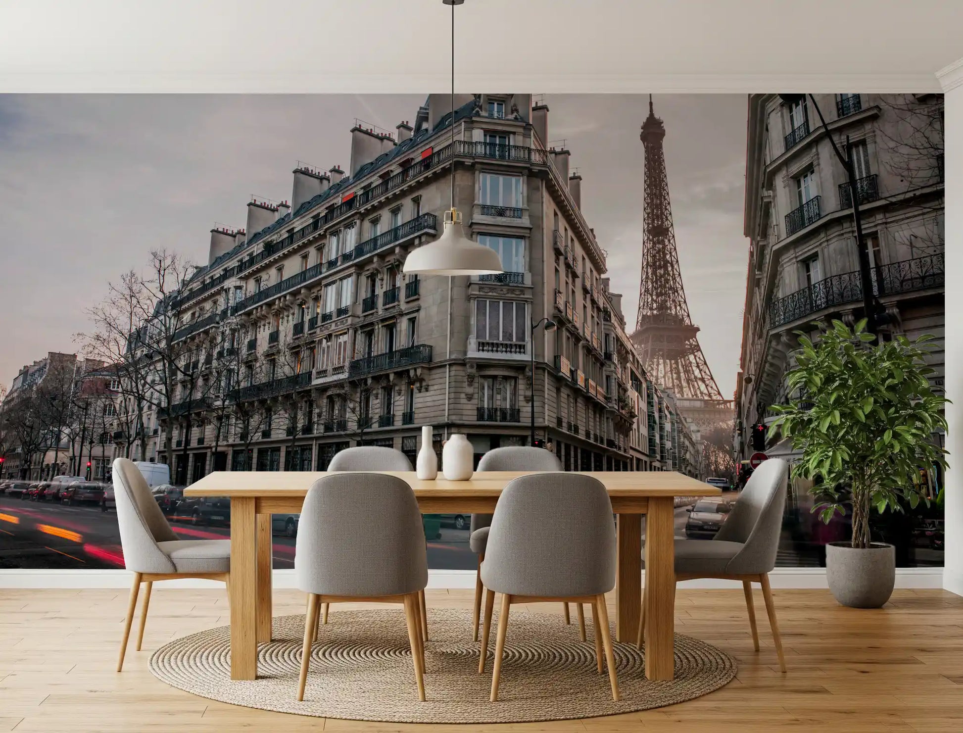 Dining room illuminated by streetlights from the Parisian Evening wall mural.
