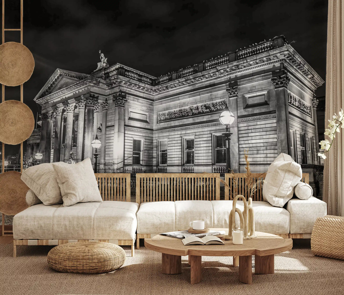 A wooden desk faces the striking Classical wall mural within a quiet Living room 