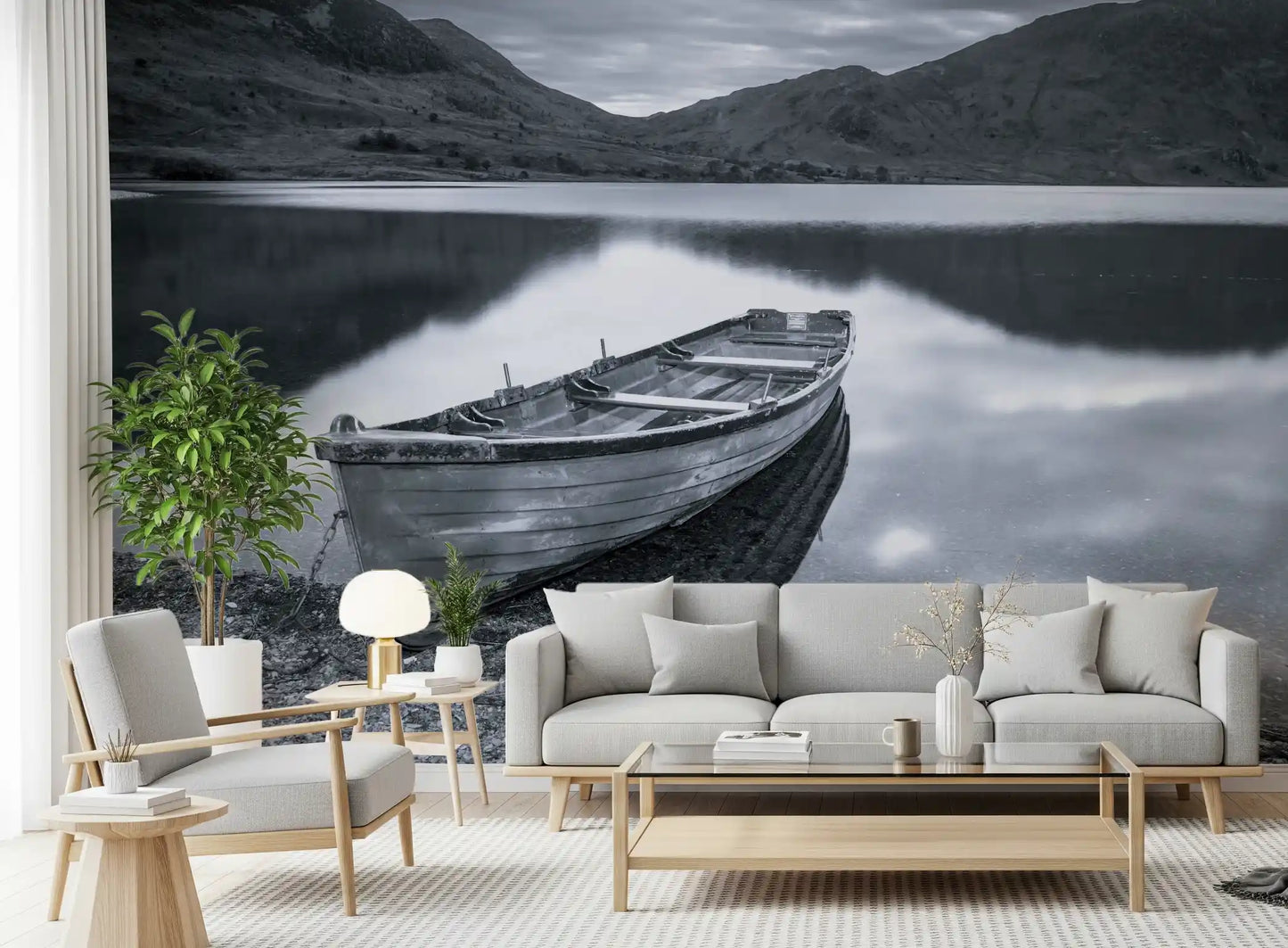 Grey ridges and lake water keep the Living room restful behind a Silent Waters wall mural.