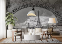 Eiffel Tower stands beneath a wide stone arch on the Timeless Parisian Vista wall mural
