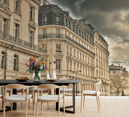 Parisian Facades wall mural fills the dining room with stormy old world city character.