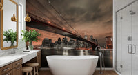 Copper dusk lights and skyline depth fill an Iconic Bridge wall mural over a Bathroom