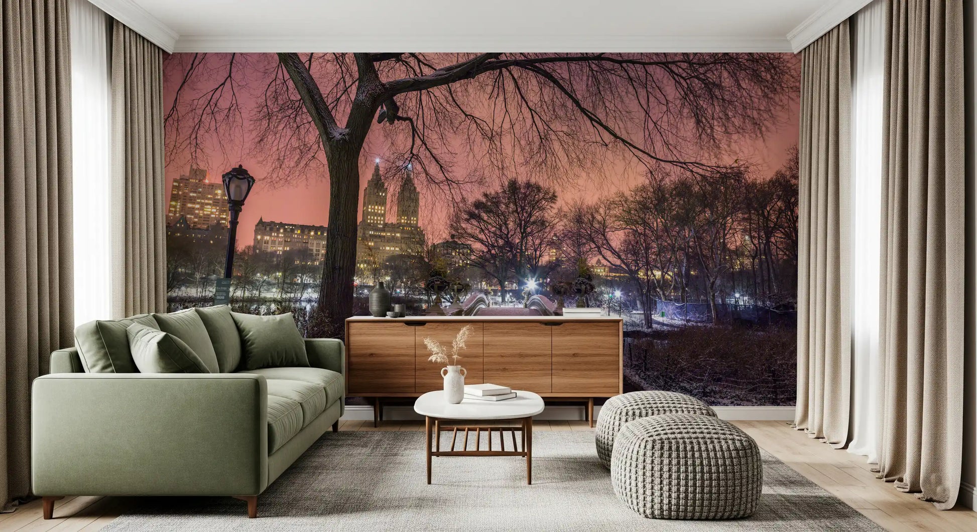 Pink twilight skies open across the living room in this Central Park bridge wall mural.