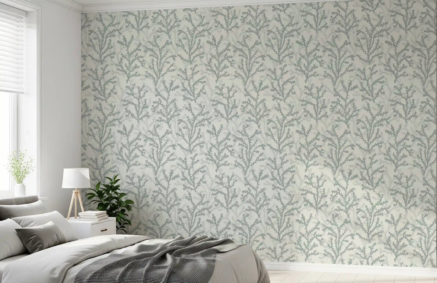 Coral sprigs scatter calm above the bedroom in this Painted Coraline wallpaper piece.