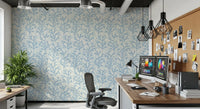 Cream meets navy and azure across the Painted Coraline Dreaming Blue wallpaper surface.