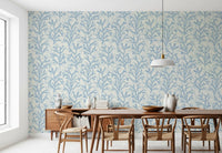 Painted Coraline Dreaming Blue wallpaper detail shows watercolour coral strokes on cream.