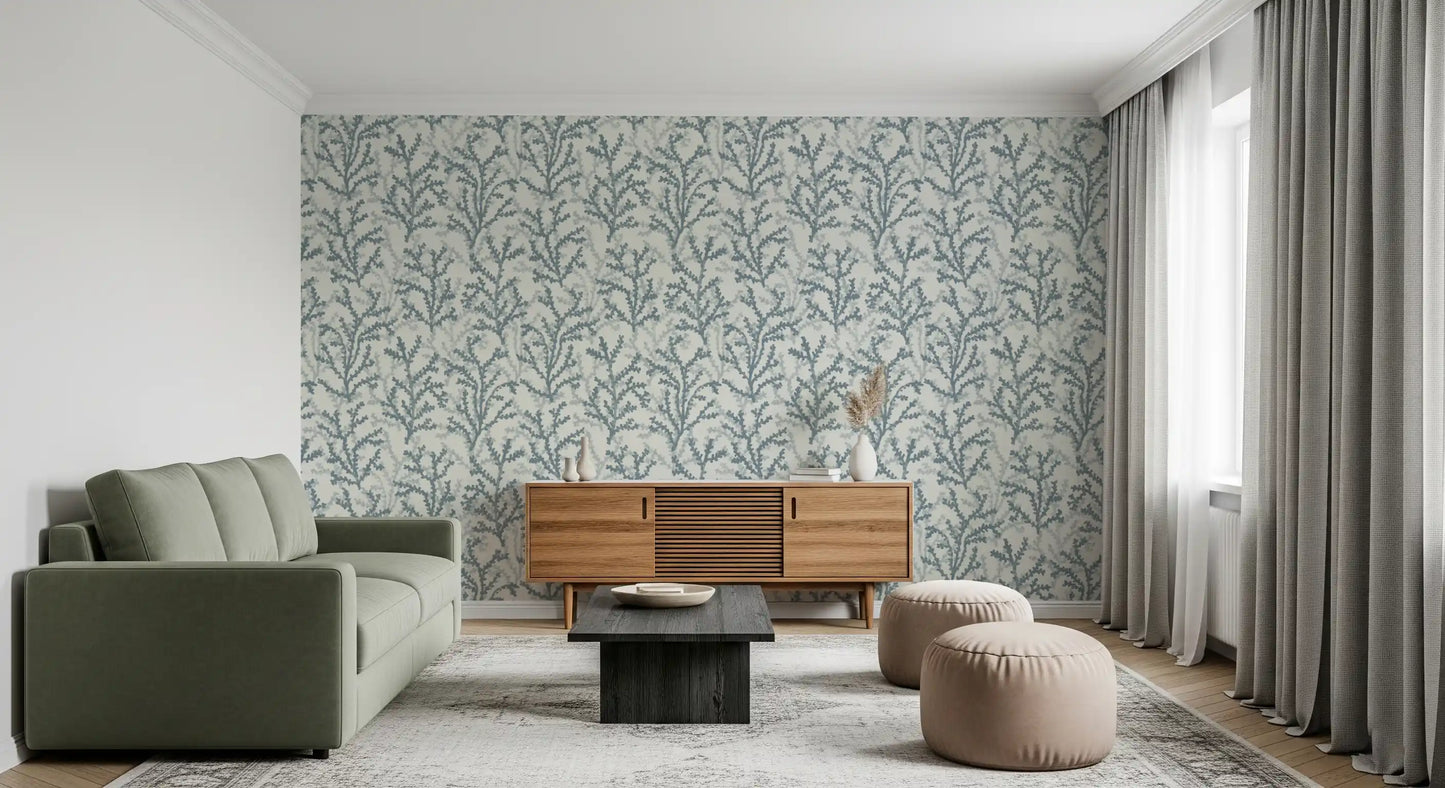 Painted Coraline Slate Gray wallpaper makes the living room feel aquatic.