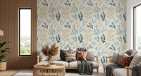 Beige and blue aquatic silhouettes float gracefully across the Painted Corals Wallpaper.