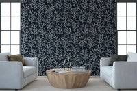 The shadowy Grey wallpaper establishes a moody atmosphere in this likely Living room.