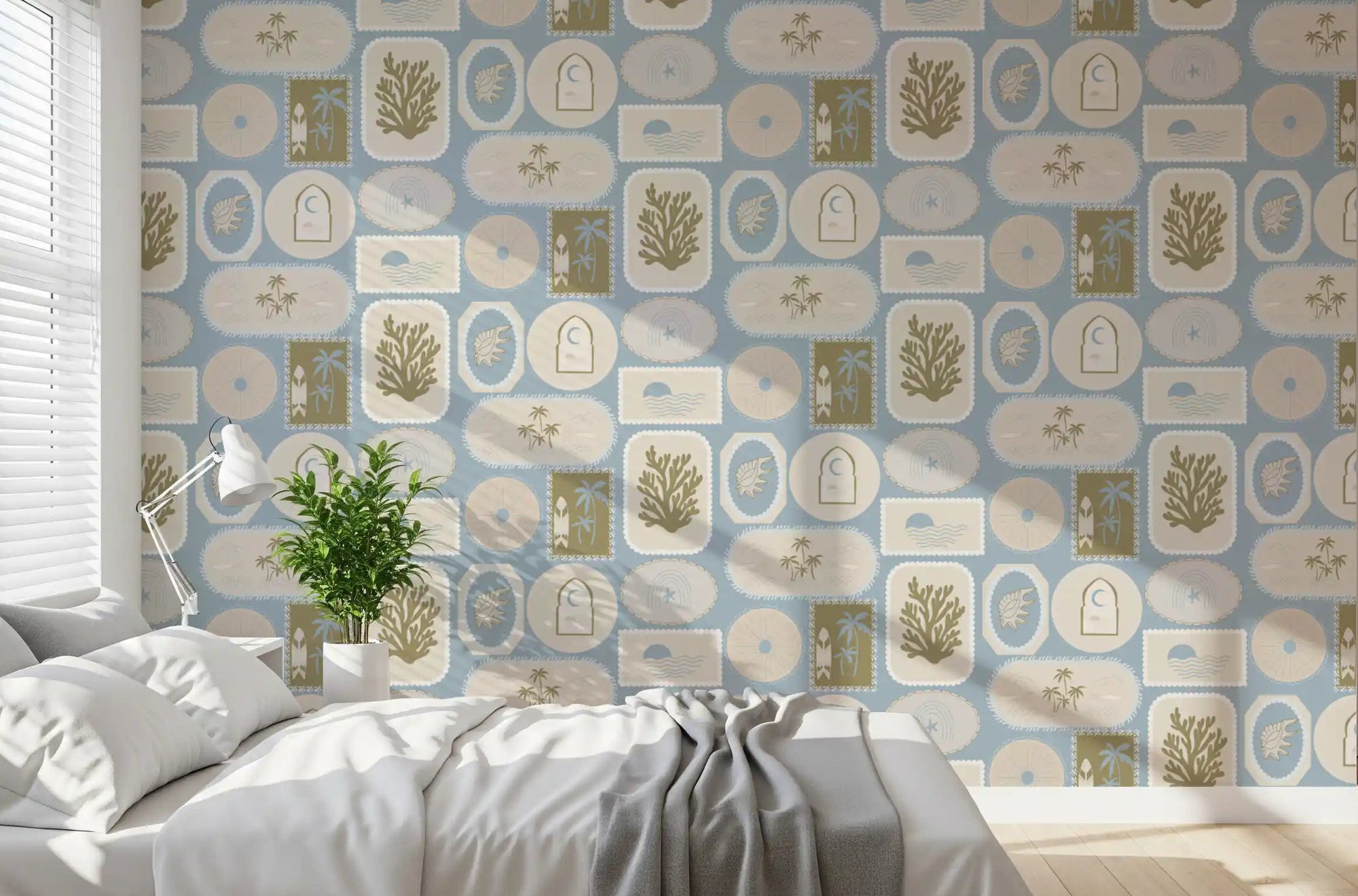 Bedroom with Soft Blue Coastal Frame wallpaper and framed palm artwork