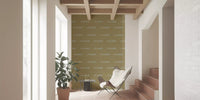 Green boho wallpaper with gentle wave forms and relaxed wall pattern