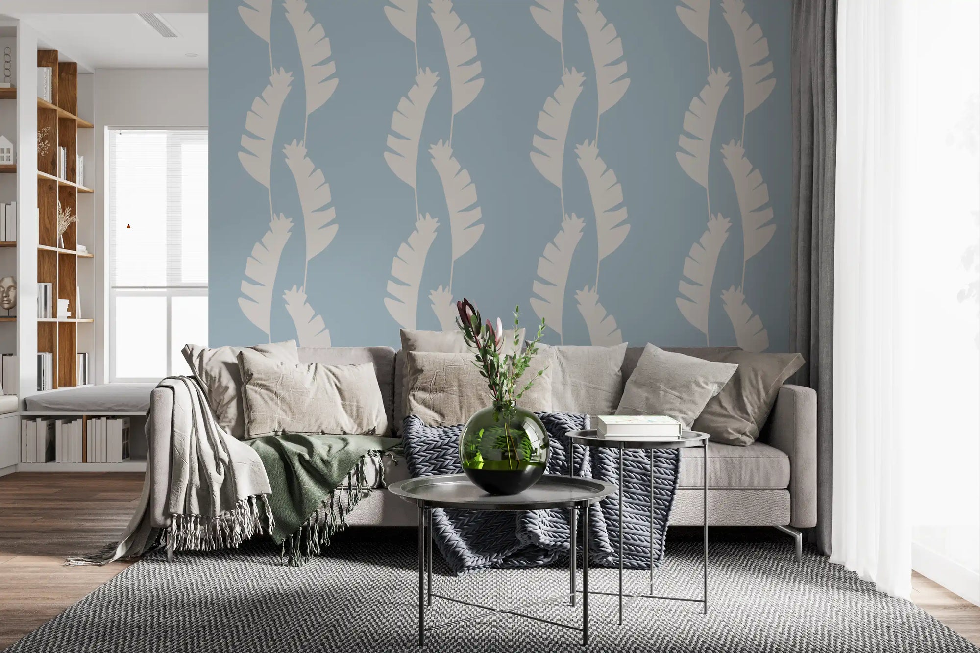 Blue botanical wallpaper with banana leaf forms and relaxed boho styling