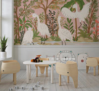 Graceful Egrets wall mural with blush backdrop, riverbank rocks, and greenery