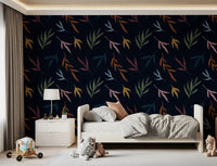 Bedroom wallpaper showing painted leaves in moody tropical colours