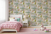 Jungle nursery wallpaper showing calm animal artwork on a pale base