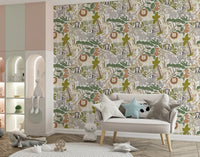 Nursery wallpaper showing giraffe, lion, elephant, and leafy jungle art