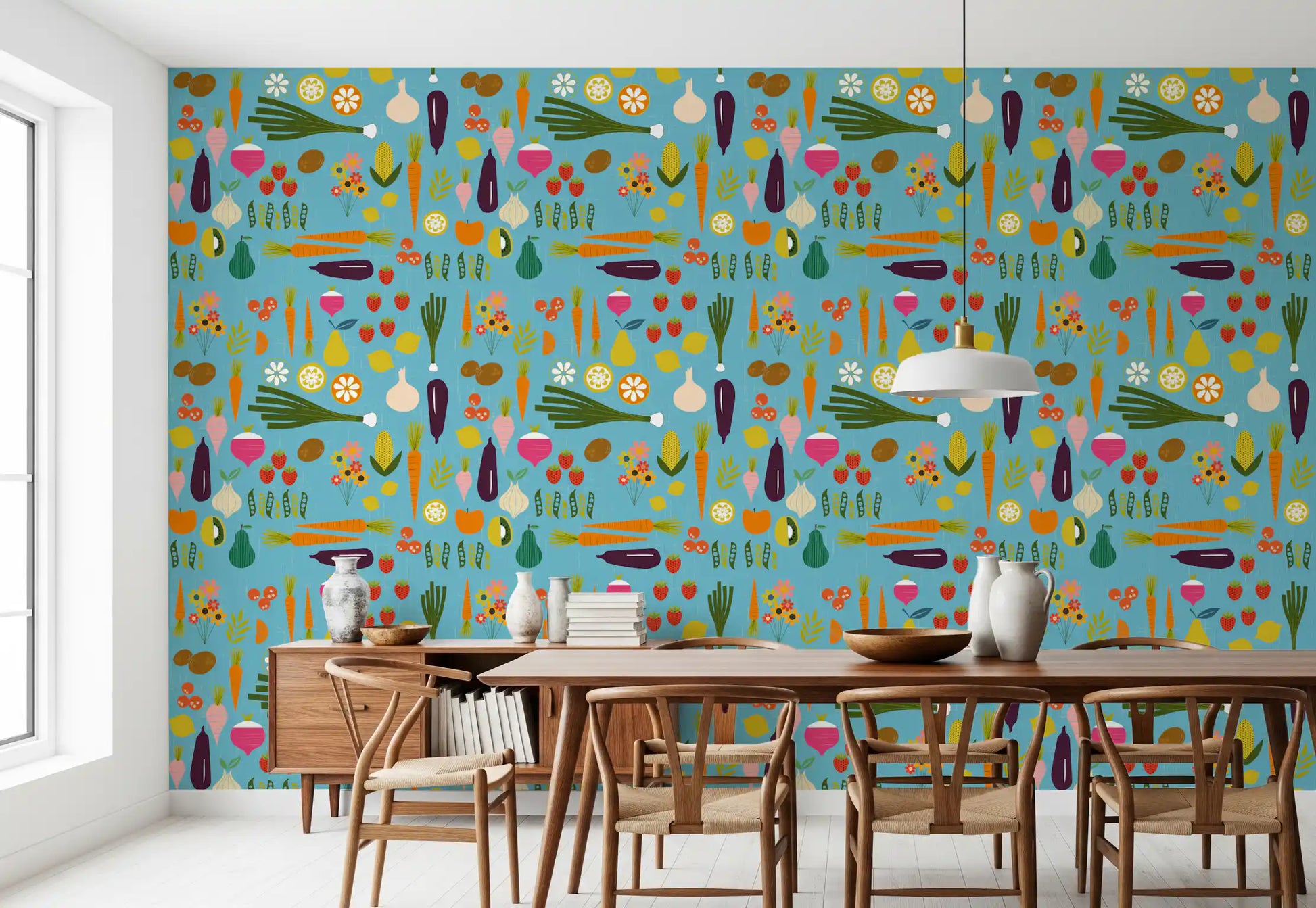 Dining area with blue produce wallpaper and bright fruit slice accents