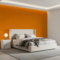 Bedroom with orange finish wallpaper and a clean retro texture