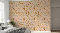 Bedroom finished in terrazzo wallpaper with muted earthy accents