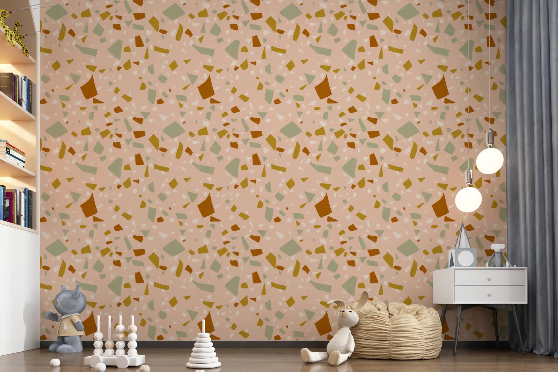 Kids room design uses warm peach wallpaper with sage abstract chip pattern