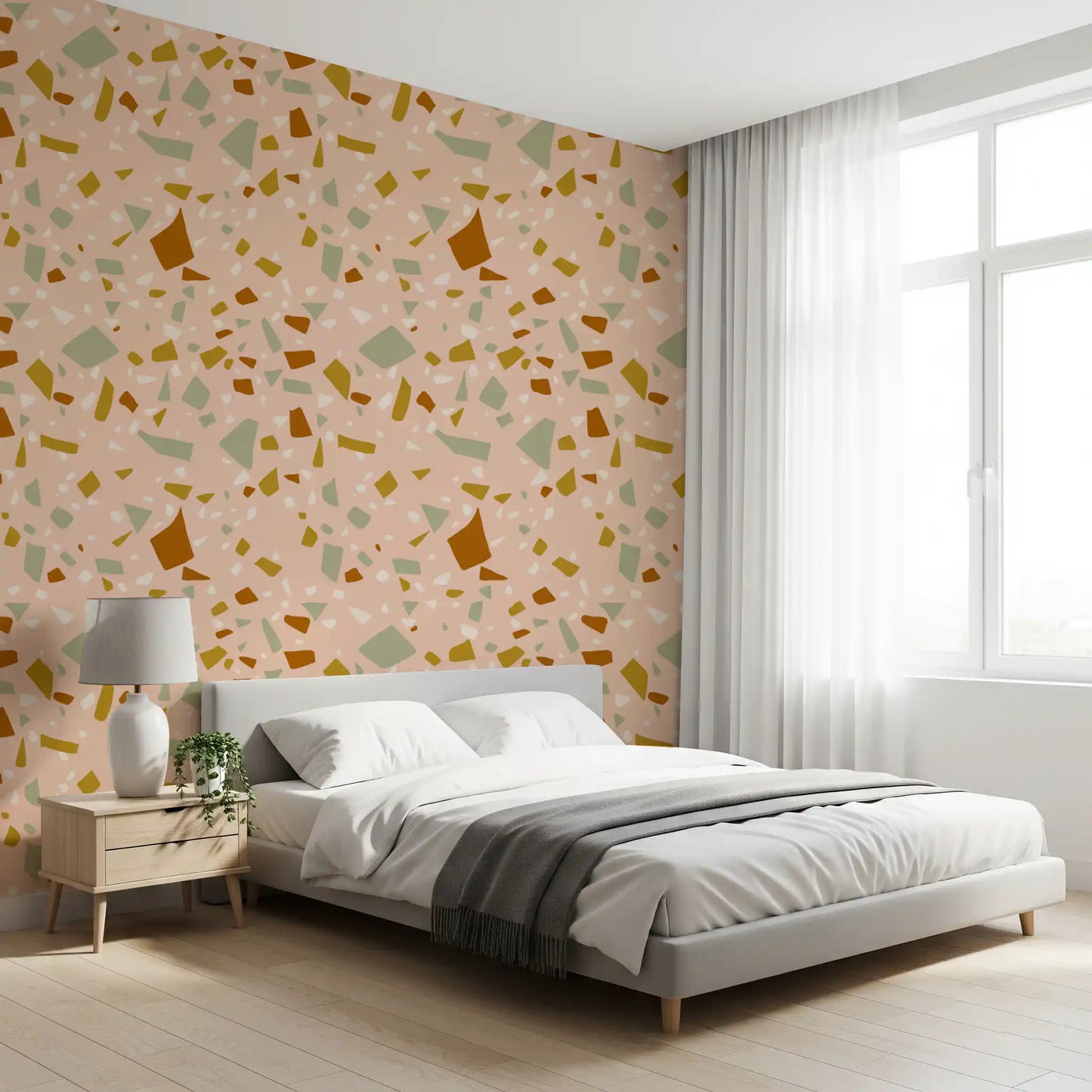 Bedroom wall carries Peach Sage Wallpaper and stone-style artwork