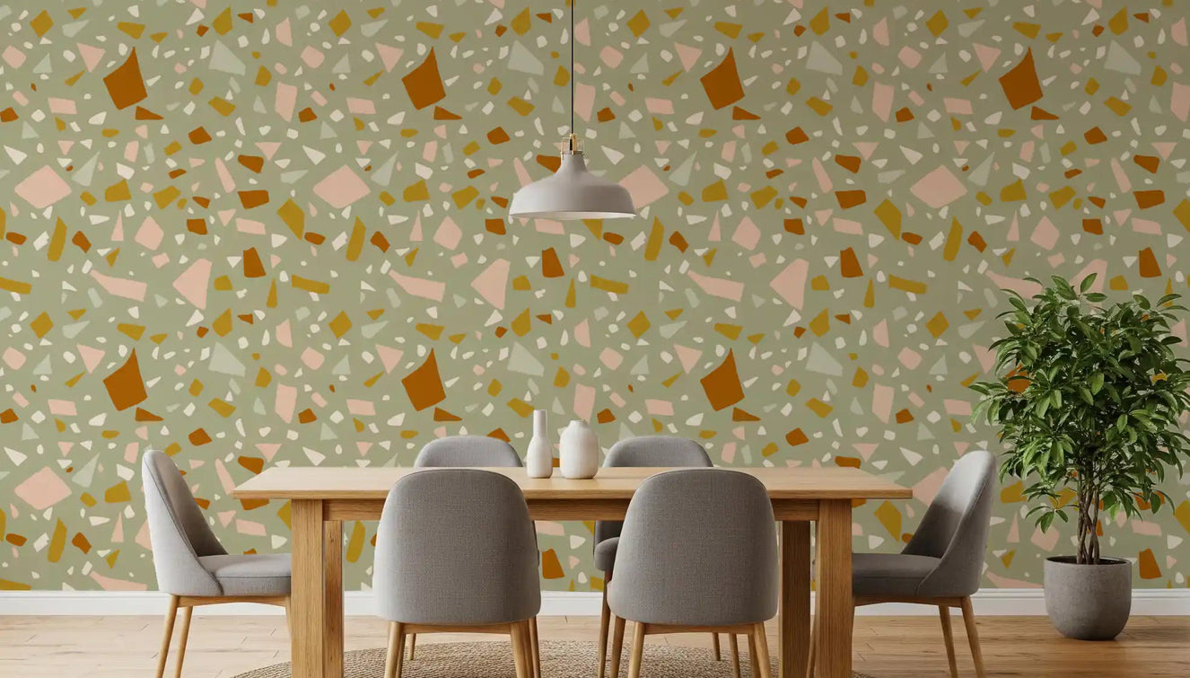 Dining room wall with Sage Peach Terrazzo wallpaper and soft chip detail