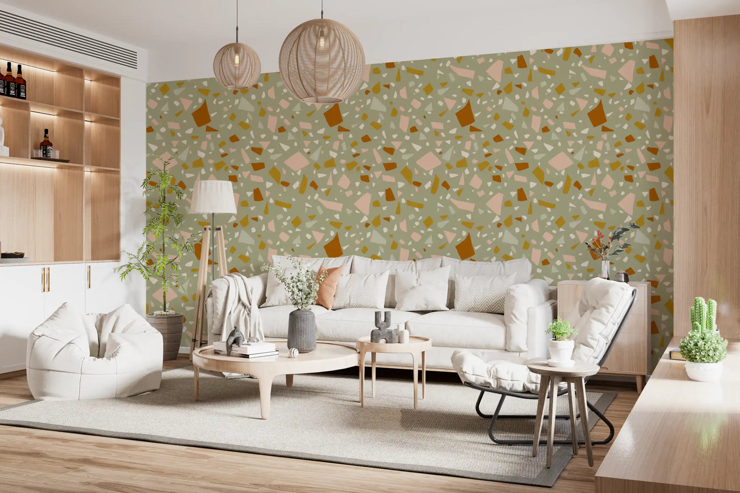 Living room wall styled with Mediterranean Wallpaper in peach sage tones