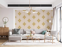 Living room wall carries Gold Sand wallpaper with Mediterranean motif detail