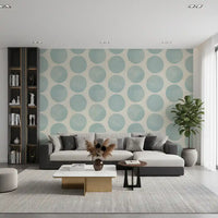 Living room with soft blue dot wallpaper on a warm beige background