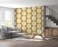 Hallway featuring cream circle wallpaper on a rich mustard base