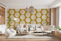 Soft speckling defines this cream circle wallpaper with modern appeal