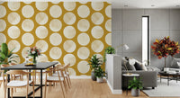Oversized cream motifs shape this mustard pattern wallpaper beautifully