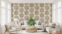 Living room styled in stippled circle wallpaper with soft beige dots