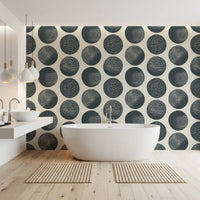 A bold layout shapes this polka dots wallpaper with textured round motifs