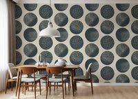 Dark blue wallpaper with large cream polka dots and stippled texture