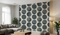 Hallway styled in dark blue circle wallpaper with soft cream background