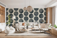 Living room with dark blue polka dot wallpaper and cream stippled circles