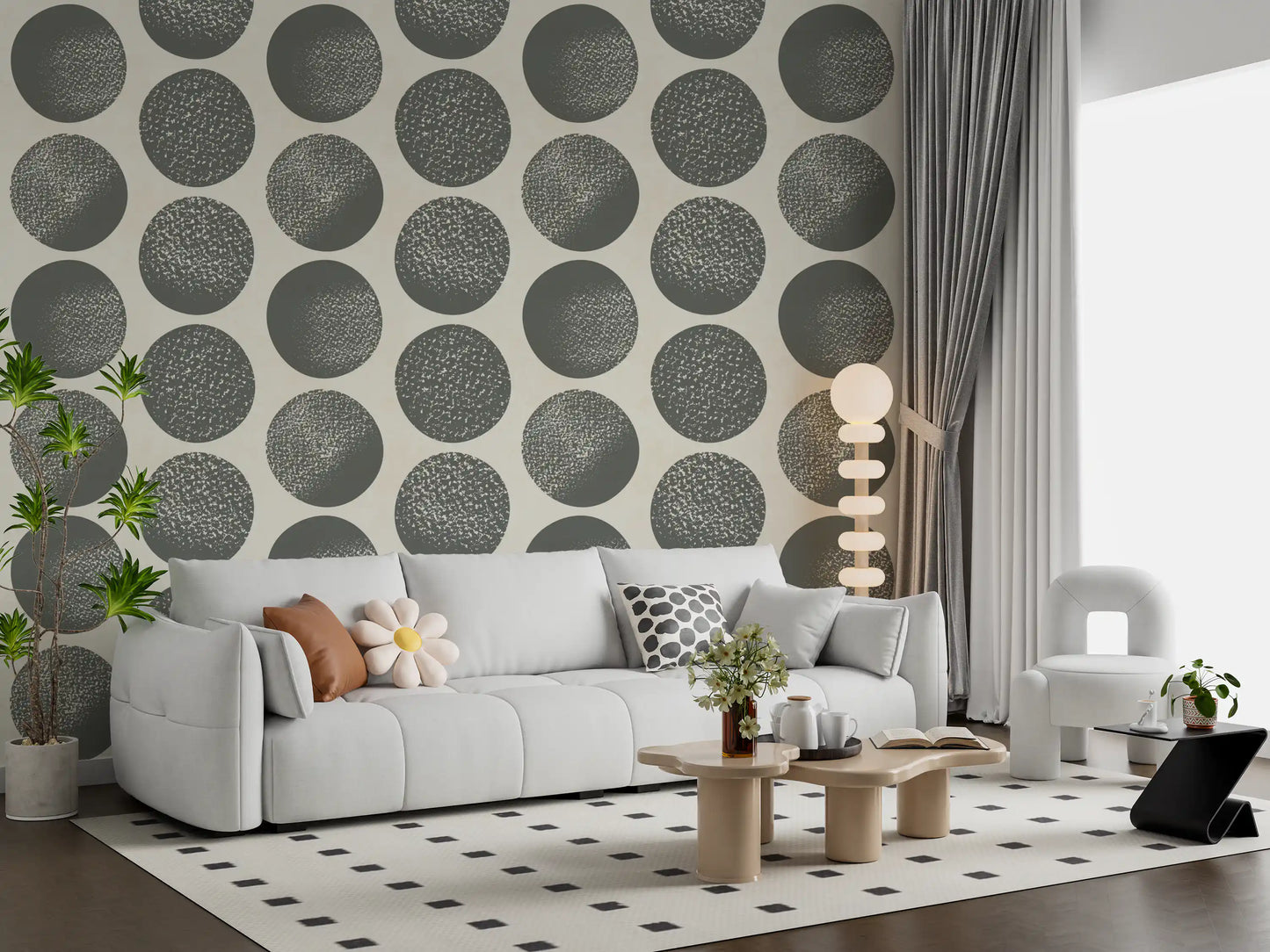 Living room with slate grey polka dot wallpaper on a soft cream background