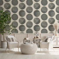 Cream wallpaper featuring organic grey circles and stippled surface detail