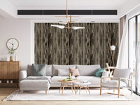 Walnut umber wallpaper showing dark grain marks on a soft neutral ground