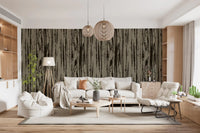 Hallway featuring walnut woodgrain wallpaper with uneven vertical marks