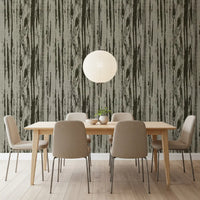 Dining room with green woodgrain wallpaper and layered abstract linework